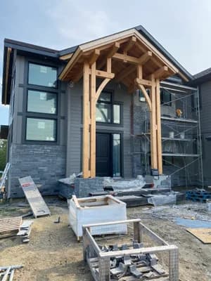 Stone entry with timber frame detail