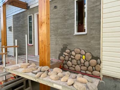 River rock installation in progress