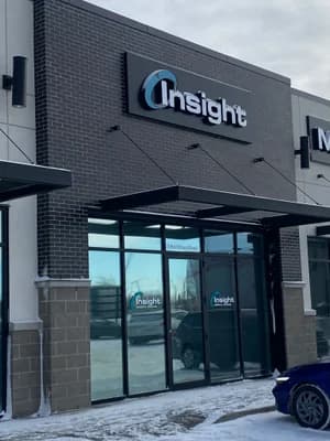 Insight Optometry commercial storefront with brick facade