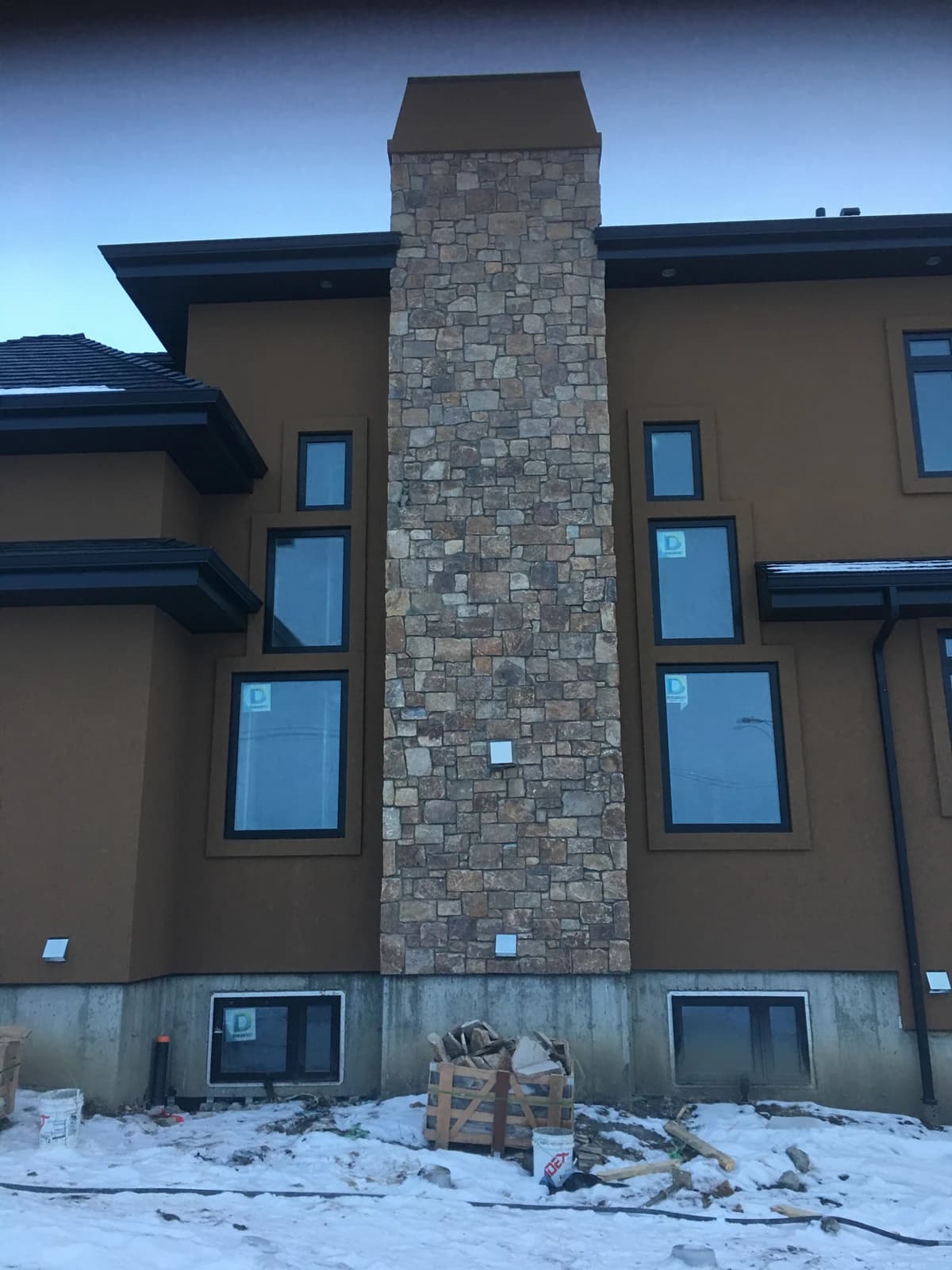 Stone chimney installation by Olympus Masonry