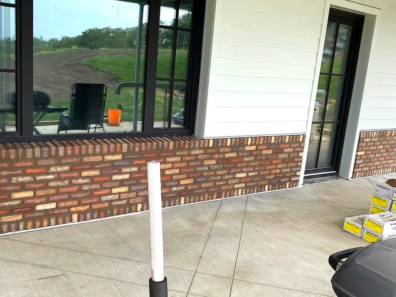 Colorful brick patio wall